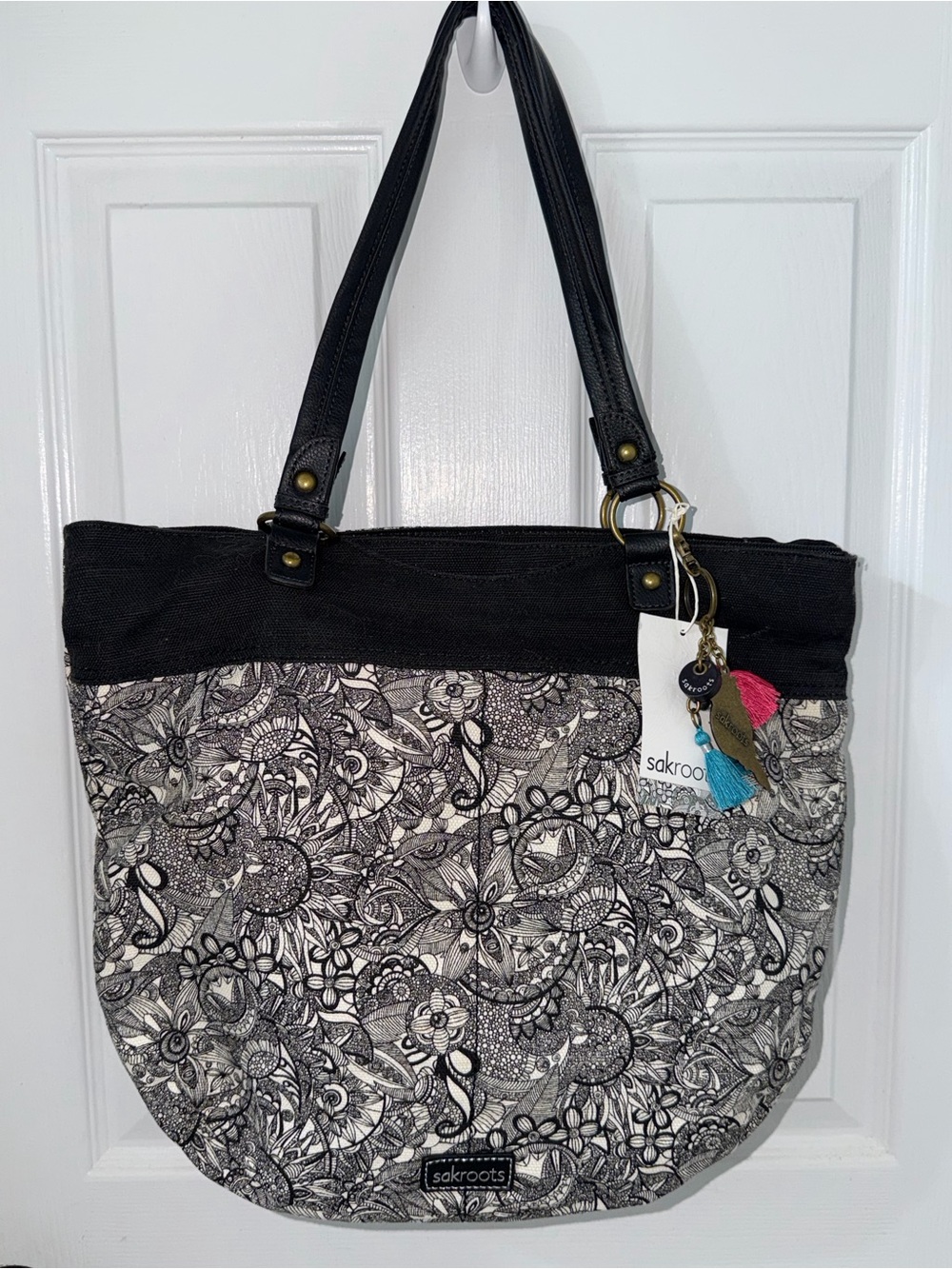 Sakroots Black & White Floral Pattern Tote with Tassel Charm